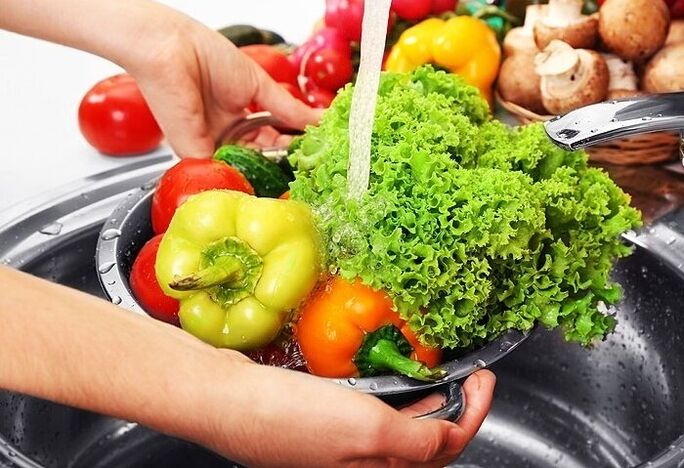 washing vegetables and herbs to prevent parasite infestation